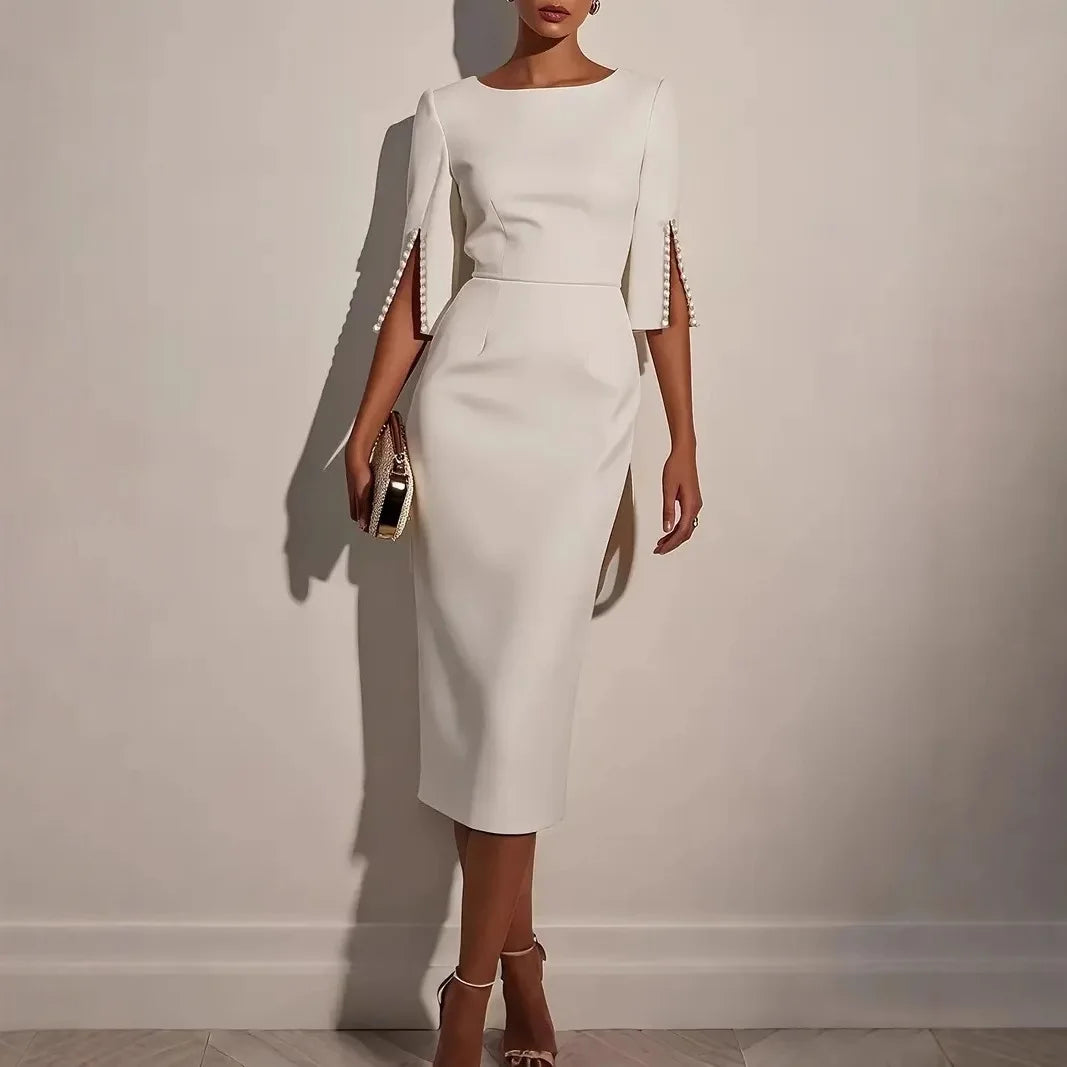 La Scintilla | VESTIDO ELEGANTE CON MANGAS ABIERTAS EMBELLECIDAS CON PERLAS