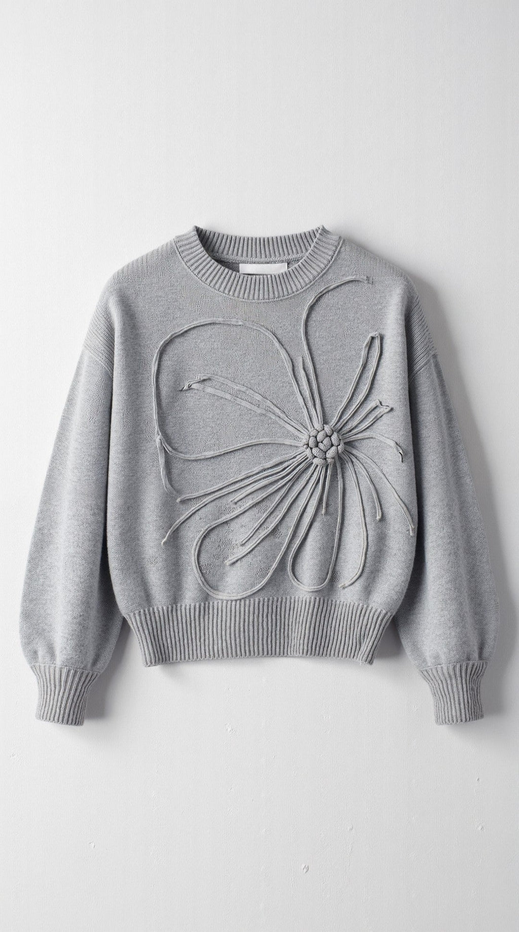 Suéter de punto con diseño floral