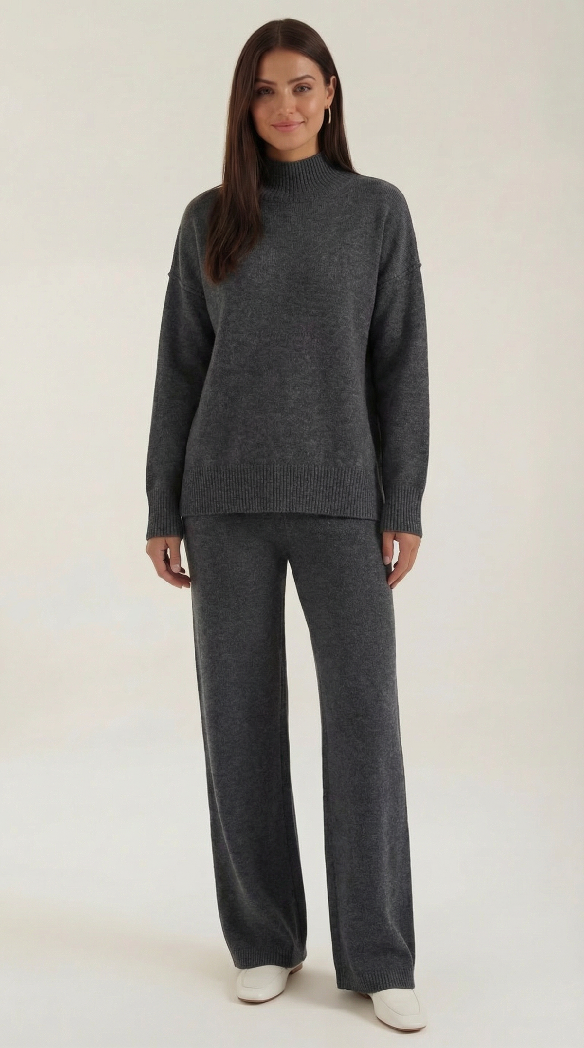 Conjunto de suéter de punto de cuello alto y pantalones vaqueros